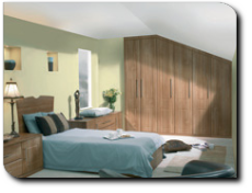 Light Walnut Surrey style sloping wardrobes Picture of Light Walnut Surrey style sloping wardrobes